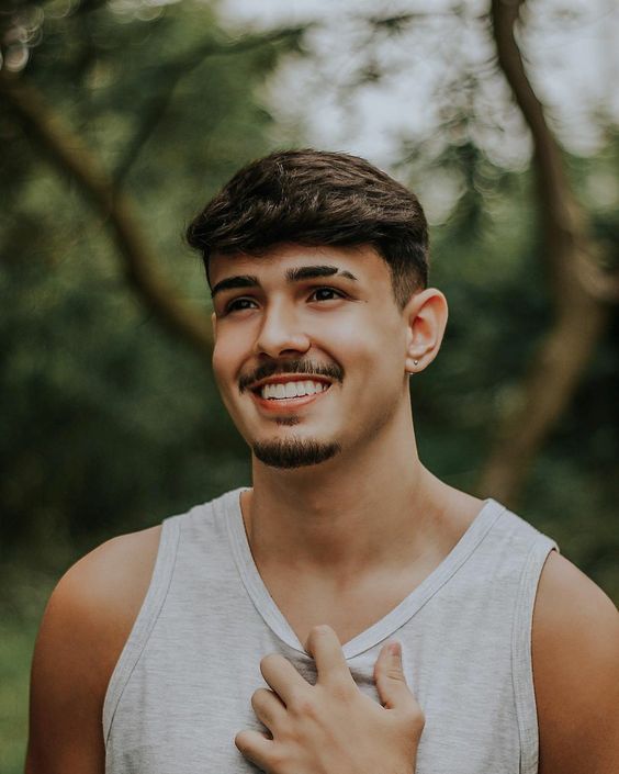 Rounded Medium Beard with Side-Swept Undercut