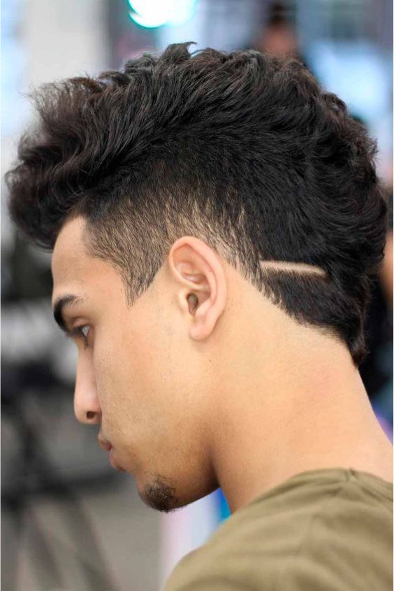 Burst Fade with Mohawk Ponytail