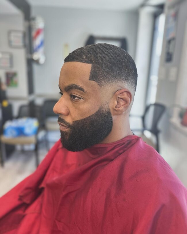 Fade hairstyle with full beard connection for Black men