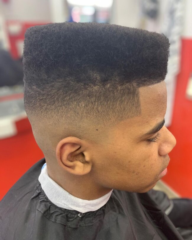 Flat top hairstyle with precision angles for Black men