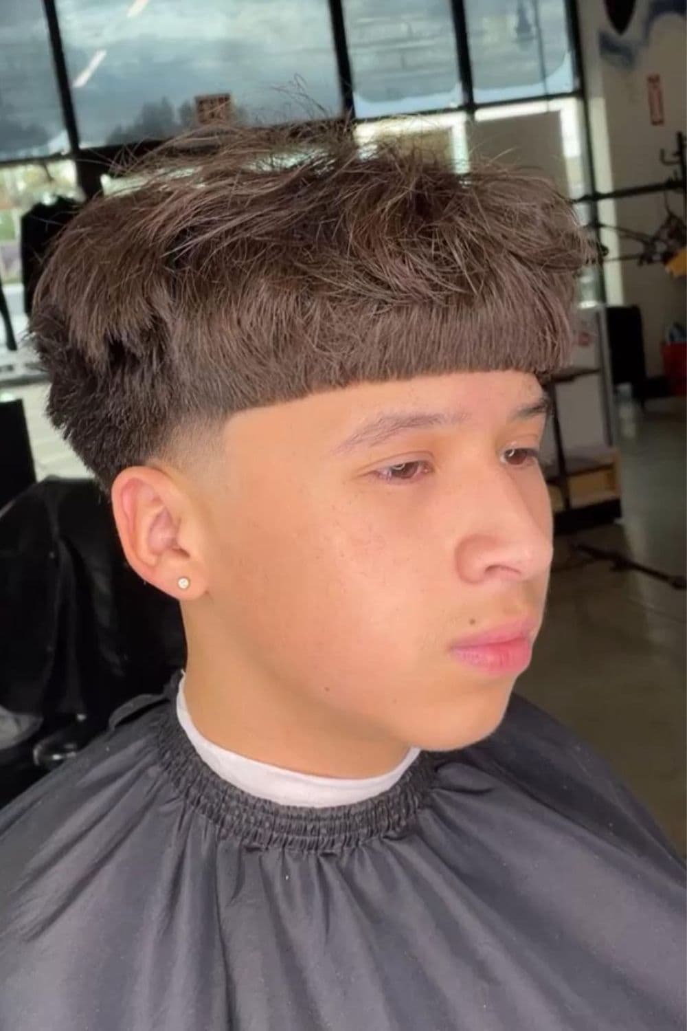 Low Taper Fade with Short Bangs