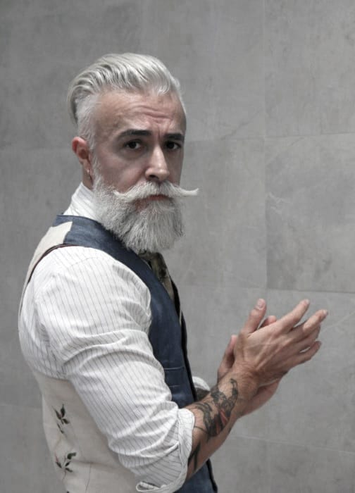 Effortlessly Distinguished: The Grey Beard with a Tidy Undercut